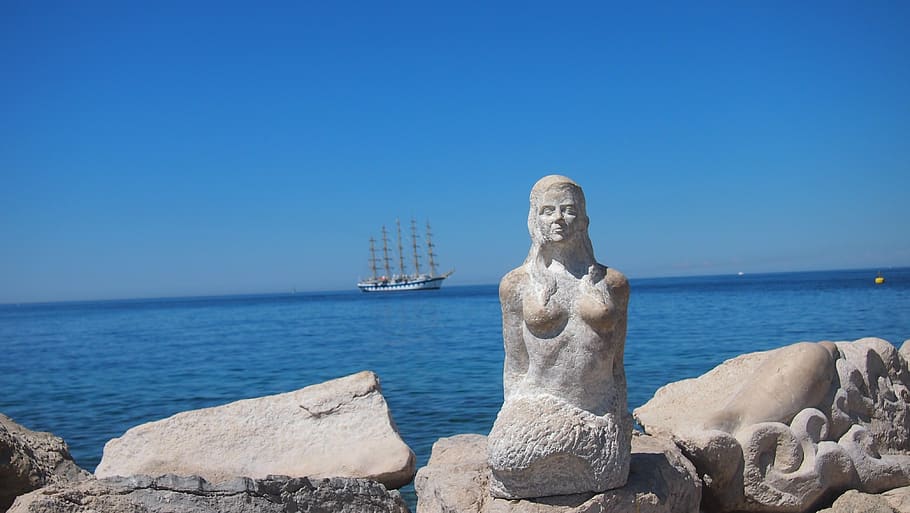 sea, statue, mermaid, water, sky, sculpture, art and craft, representation, human representation, male likeness