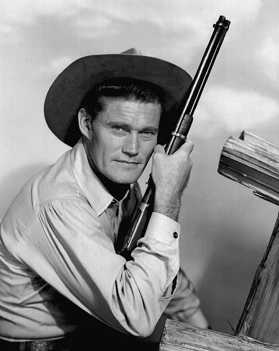 grayscale photo, man, holding, rifle, chuck connors, actor, television, tv, series, retro