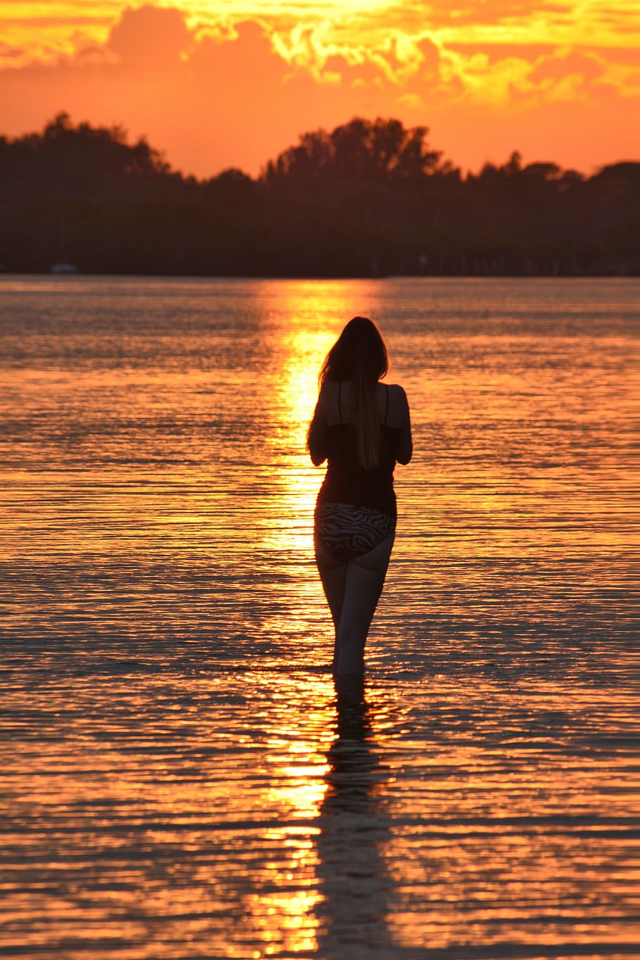 sunset, young woman, silhouette, beach, water, orange color, sky, beauty in nature, scenics - nature, real people