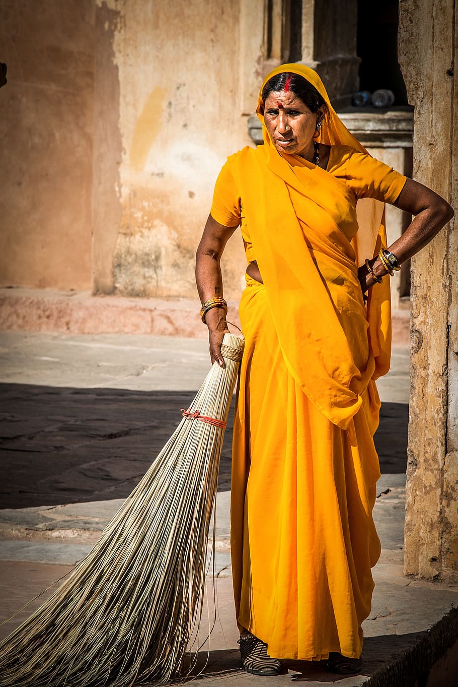woman, yellow, sari dress, holding, broomstick, indian woman, india, person, human, tradition