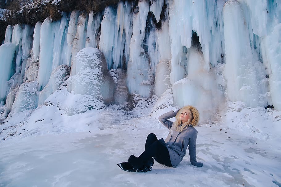 blonde in a winter wonderland, winter, glacier, icicles, blocks of ice, ice, beautiful, girl sitting in snow, snowy, fabulously