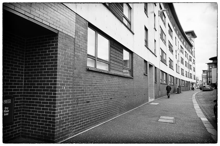 grayscale photography, building, Street, Man, Walking, City, urban, walking, city, young, people