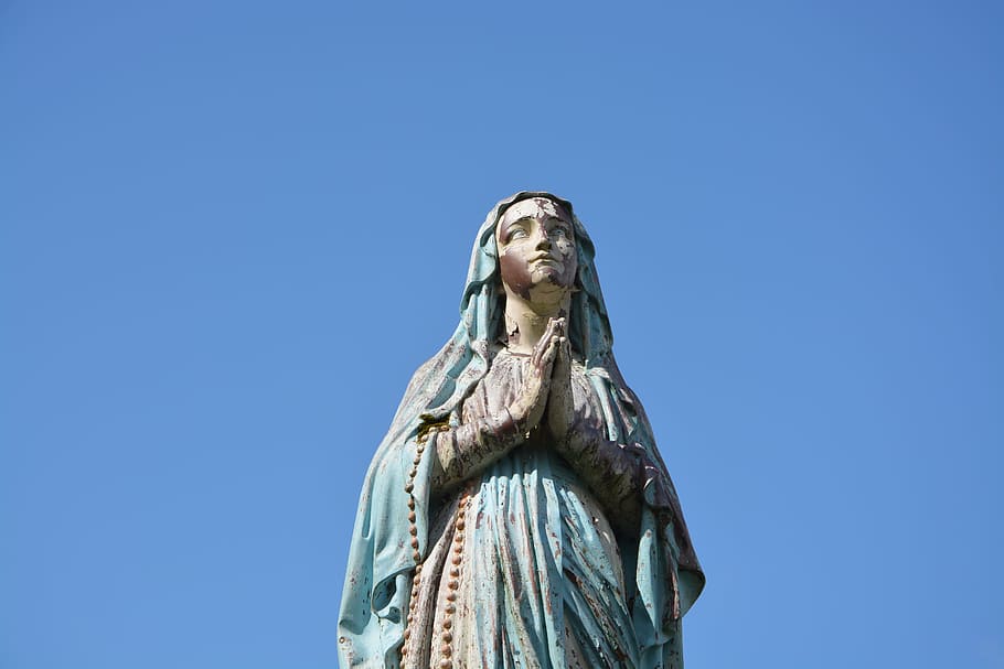 statue holy virgin, mary, religious figure, tourist town, tinteniac belief, clear sky, human representation, sky, sculpture, low angle view