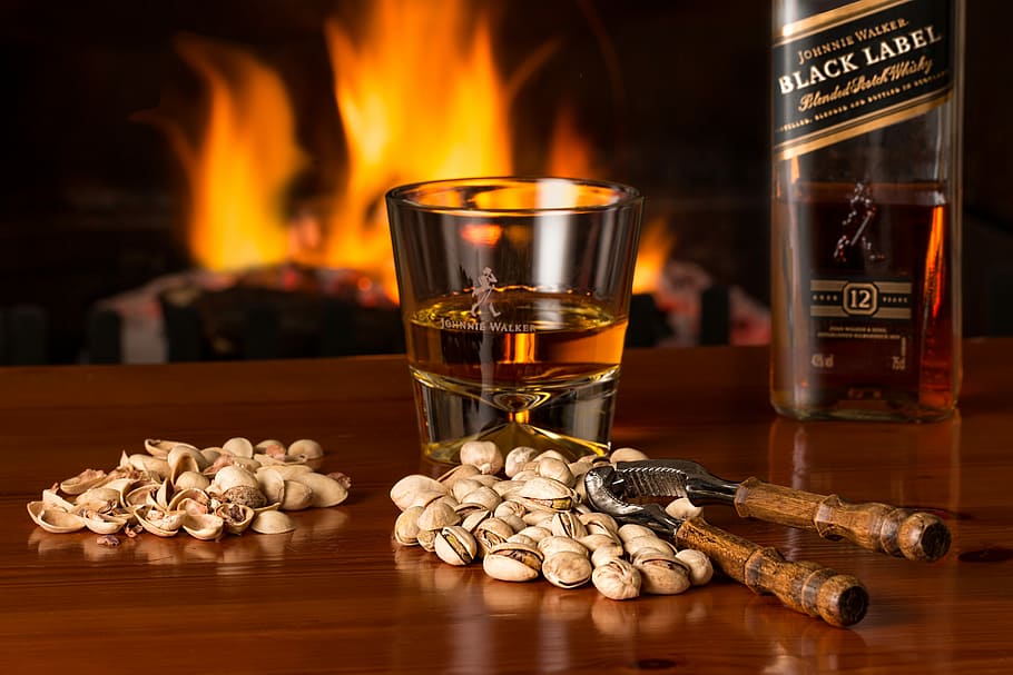 black label whisky, whisky, pistachio nuts, fireside, alcohol, beverage, cold weather, glass, liquor, luxury