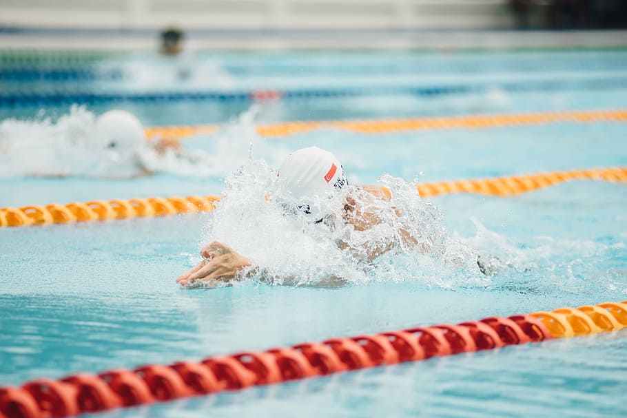 close-up photo, swimmers, competing, daytime, people, man, guy, swimming, sports, race