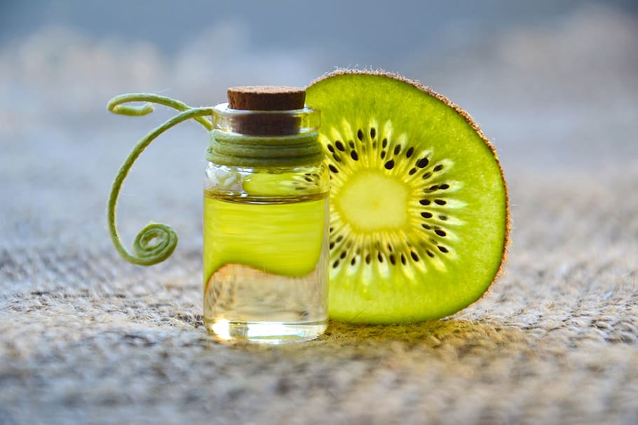 kiwi fruit, clear, glass bottle, cosmetology, essential oil, oil cosmetic, essential oils, natural product, kiwi, natural cosmetic