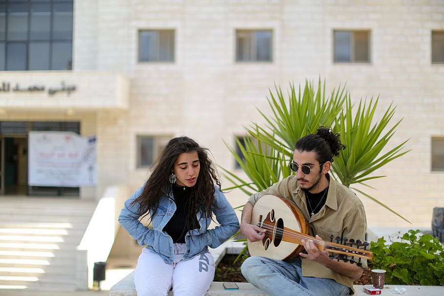 Birzeit, Ramallah, Palestine, two people, togetherness, sitting, casual clothing, young adult, music, architecture