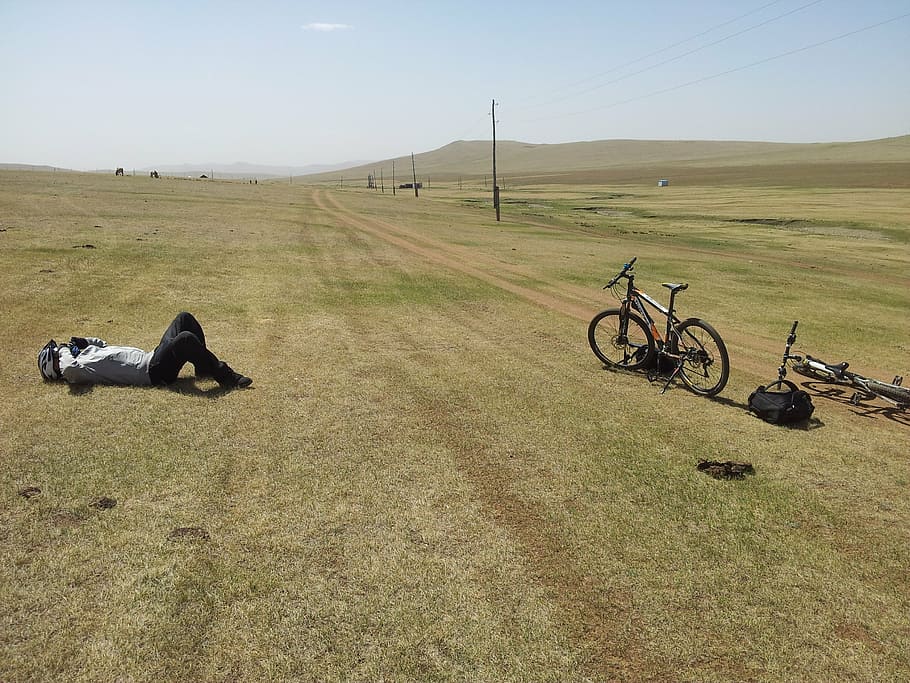 tired, bicyclist, mongolia, bicycle, outdoors, sky, grass, environment, nature, land