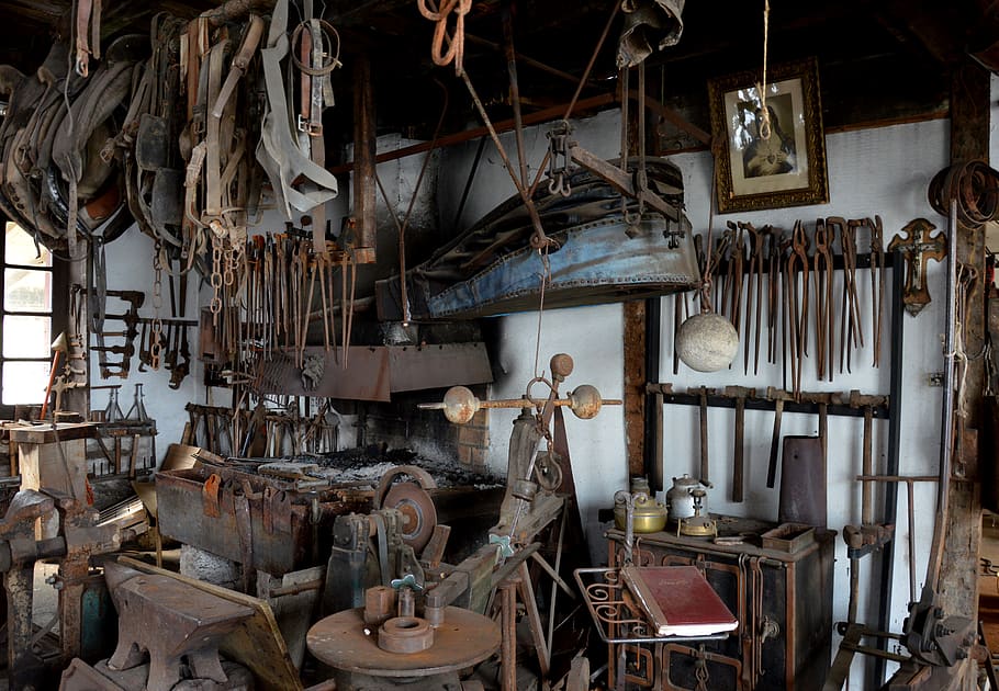 blacksmith, forge, anvil, wrought iron, workshop, large group of objects, indoors, hanging, choice, work tool