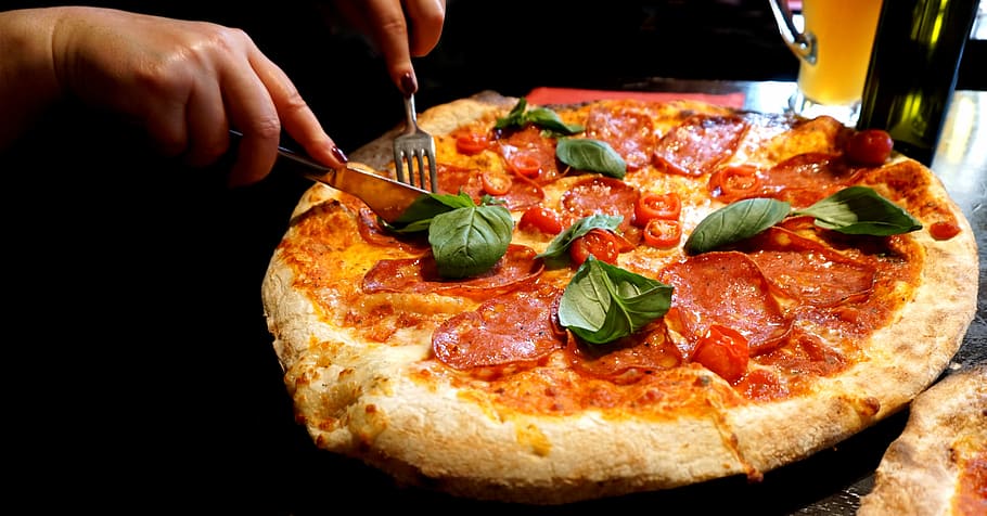 person, slicing, pepperoni pizza, pizza, cheese, food, mozzarella, refreshment, crust, restaurant