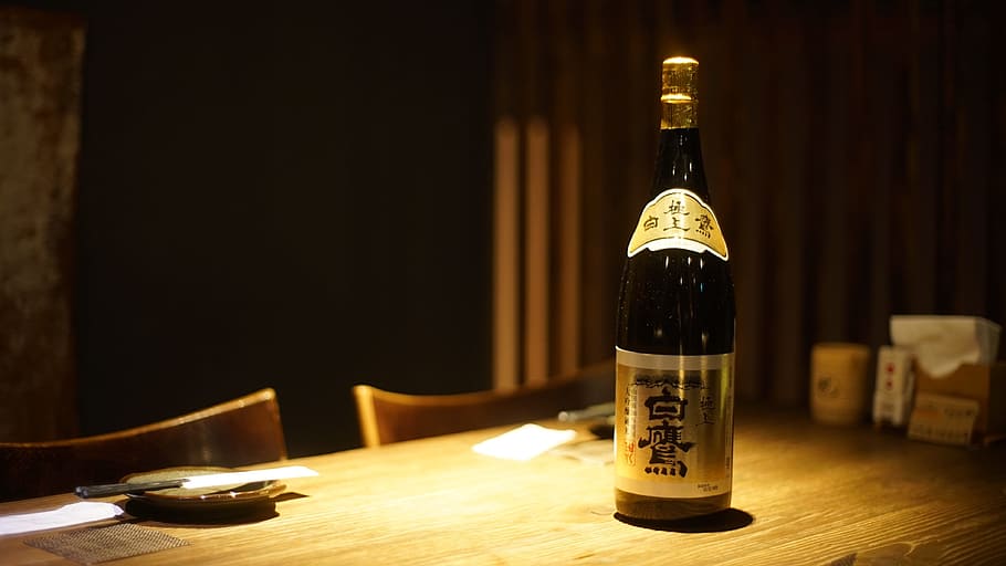low-light photo, bottle, brown, table, Sake, Japan, Cuisine, Wind, japan cuisine, and the wind