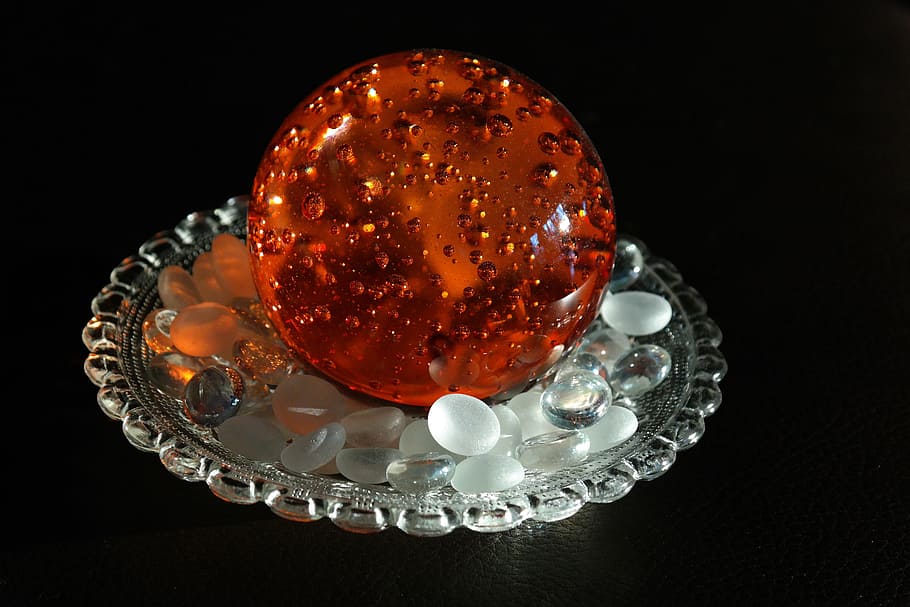 paperweight, crystal ball, colored, orange, decoration, glass, glass work, black background, studio shot, wealth