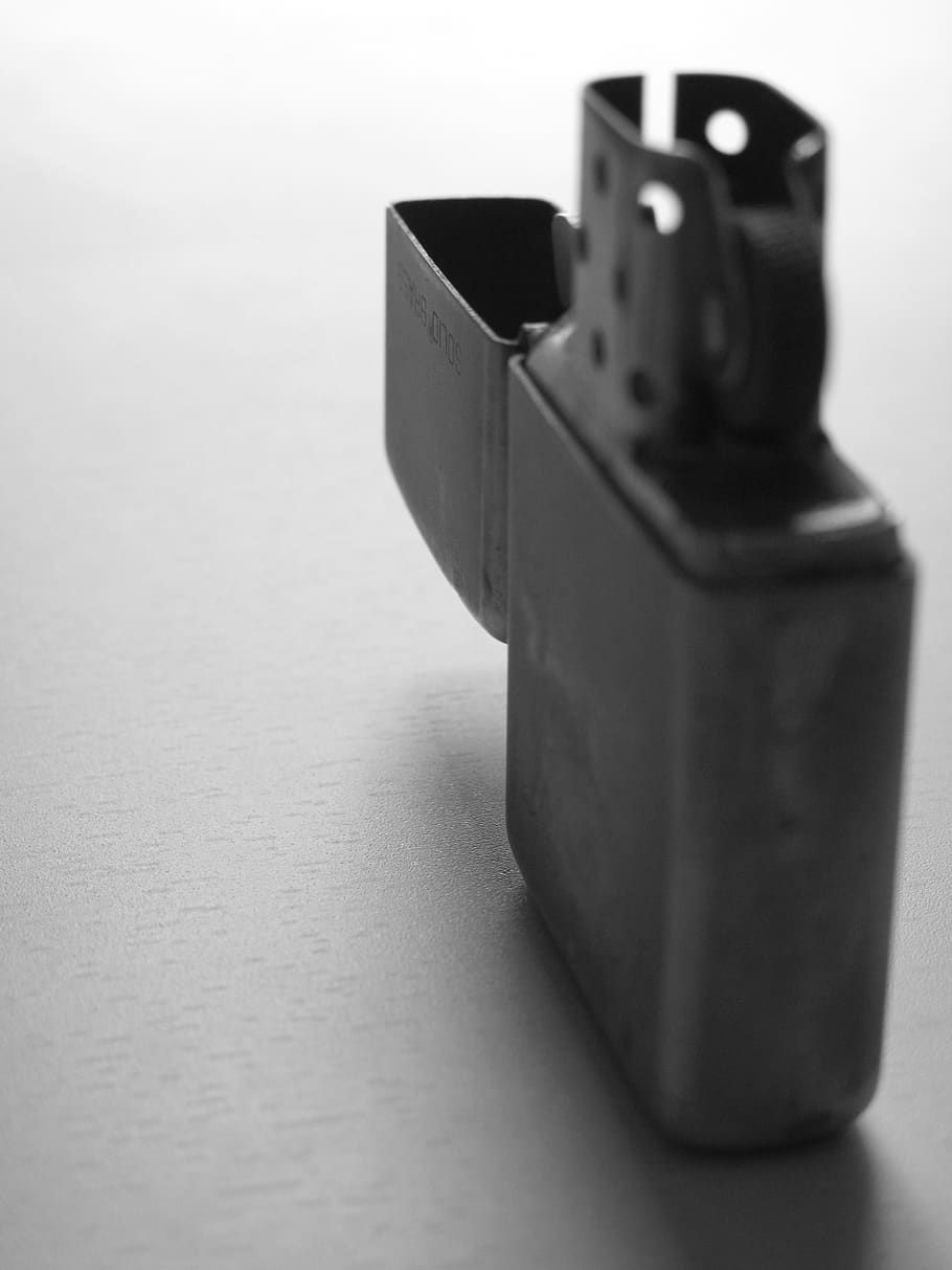 zippo, macro, lighter, black and white, shadow, still life, indoors, single object, close-up, table
