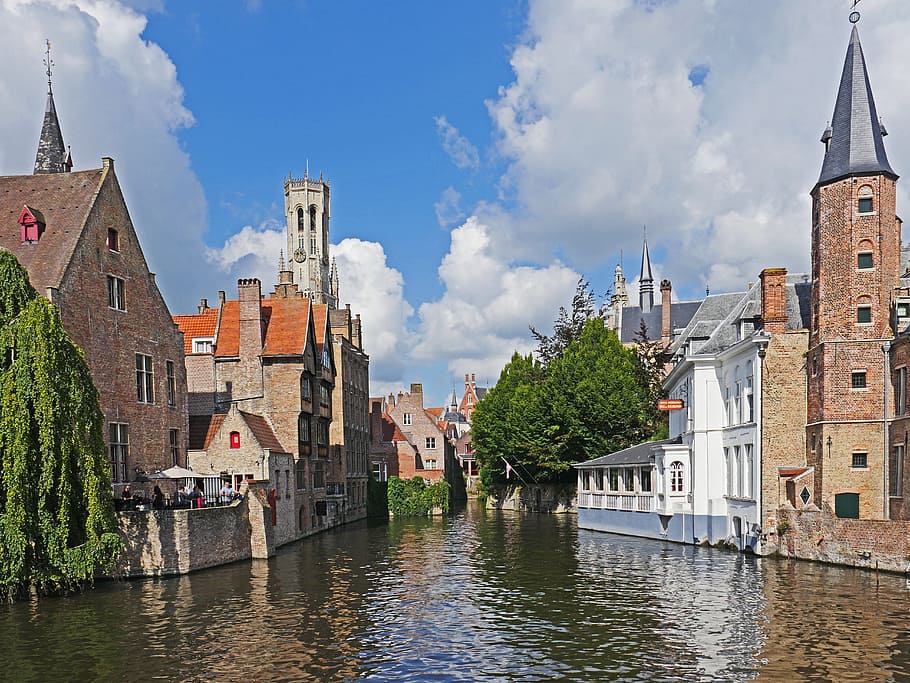 brown, concrete, house, daytime, canal in bruges, cityscape, medieval, city tower, belfry, water running