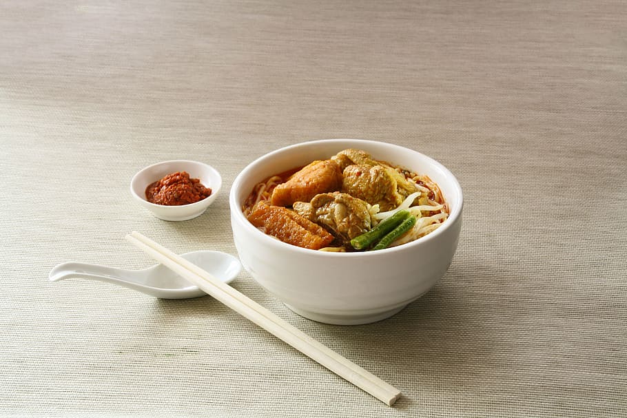 ramen, tabletop, chopstick, spoon, food, noodle, soup, chili, sauce, bowl