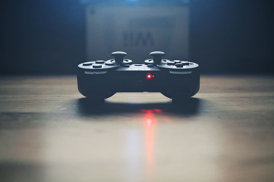 gaming, playstation controller, wii, video games, indoors, table, still life, close-up, technology, selective focus