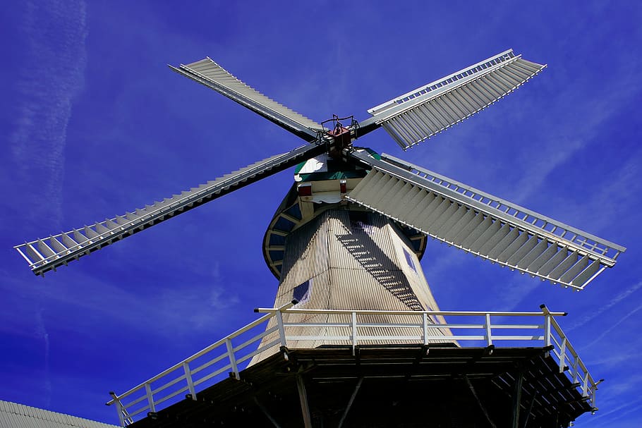 white wind turbine, windmill, perspective, wing, historically, building, wind energy, sky, linkage, landmark