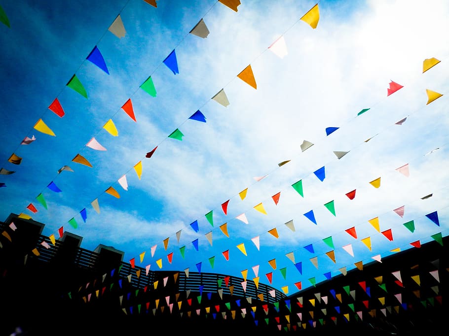 hanged assorted-color buntings, sky, blue, flag, colorful, cloud, holiday, sunny, summer, multi colored