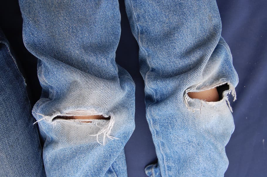 person, wearing, blue, distressed, jeans, denim, torn, ripped, worn, fashion