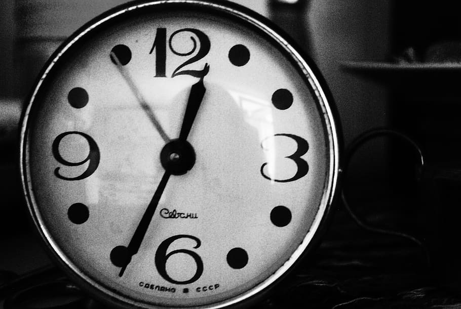 black and white, clock, number, close-up, time, indoors, focus on foreground, accuracy, clock face, minute hand