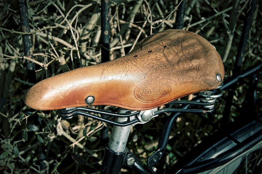 brown, leather bicycle saddle, saddle, bicycle saddle, leather saddle, suspension, hand labor, leather, spring, manufactory