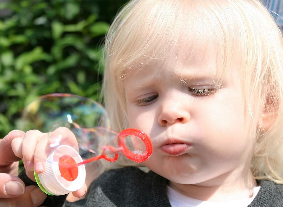 child blowing bubbles, child, soap bubbles, fun, face, funny, girl, make soap bubbles, girl plays, puste fix
