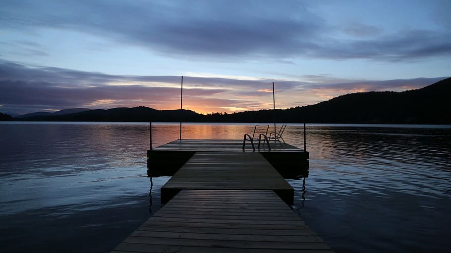 wooden, dock, dawn, wharf, lake, sunset, sun loungers, mountains, blue purple clouds pink, reflections on the water
