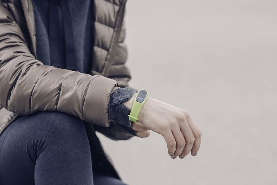 person, wearing, green, xiaomi mi activity tracker, people, man, time, accessories, clock, jacket