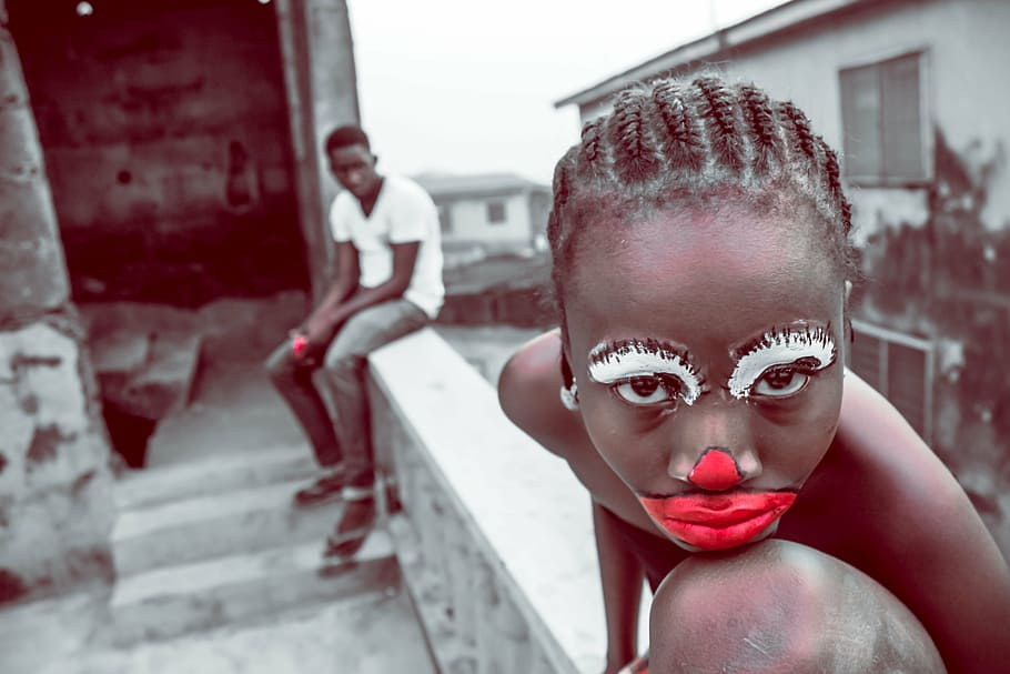 woman, face paint, child, clown, bored, make up, portrait, red, one person, looking at camera