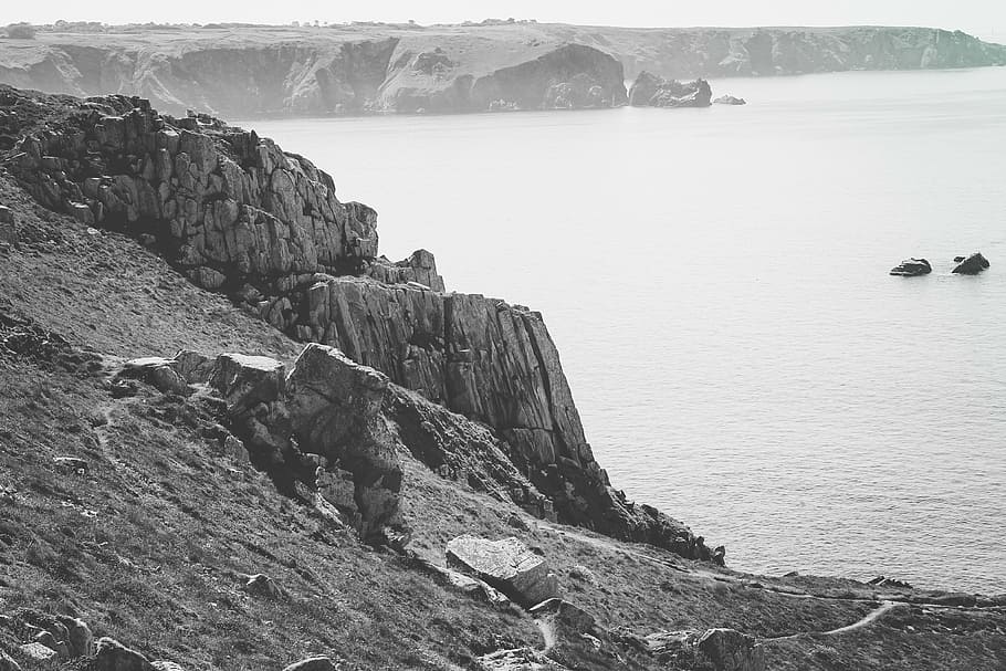 cliff, body, water, grayscale, rock, near, sea, black and white, path, grass