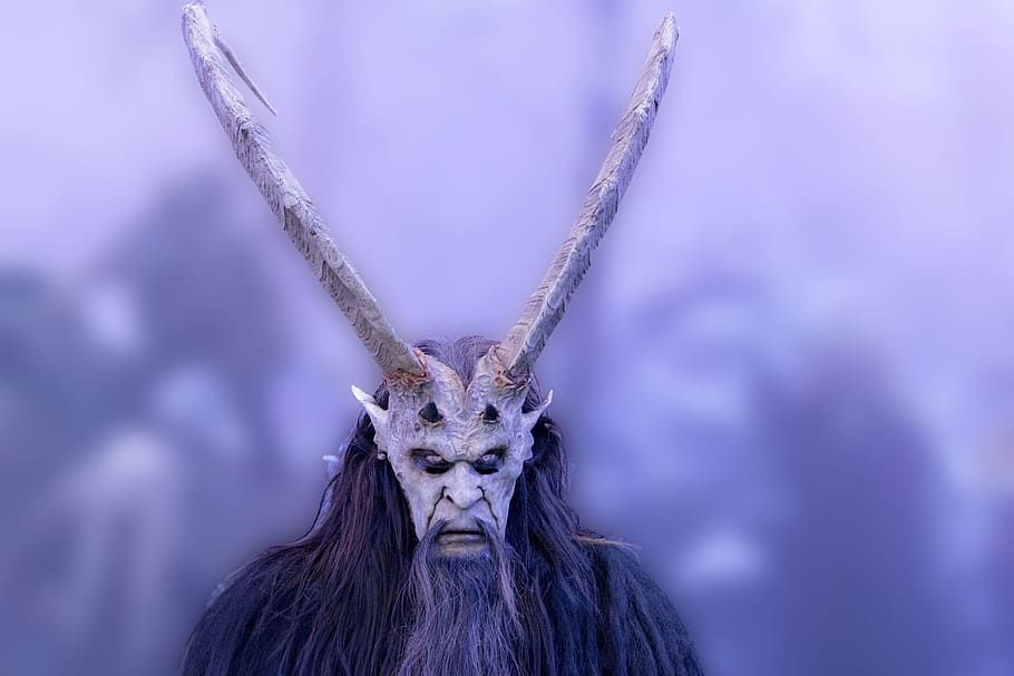 selective, focus photo, person, wears, gray, animal mask, horn, Humanoid, long, horns
