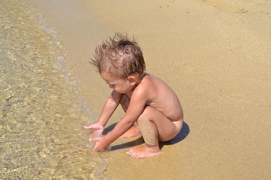 toddler, playing, sand side beach, daytime, sea, holiday, holidays, sardinia, beach, hot
