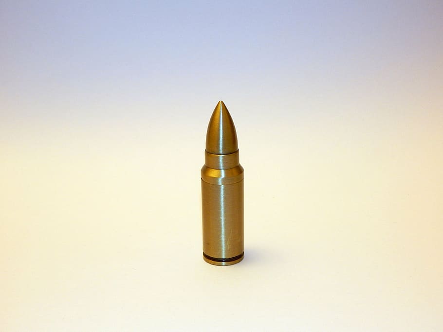 bronze-colored ammunition, standing bullet, bullet, ammunition, brass, shell, copper, slug, round, projectile