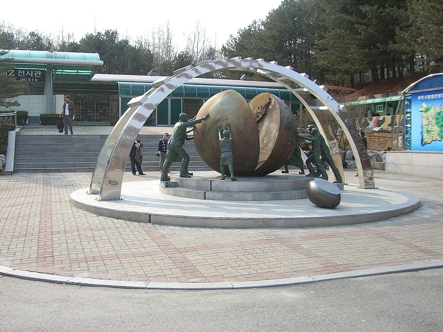 group, people, pushing, globe statue, south korea, north korea, dmz, korea, border, monument