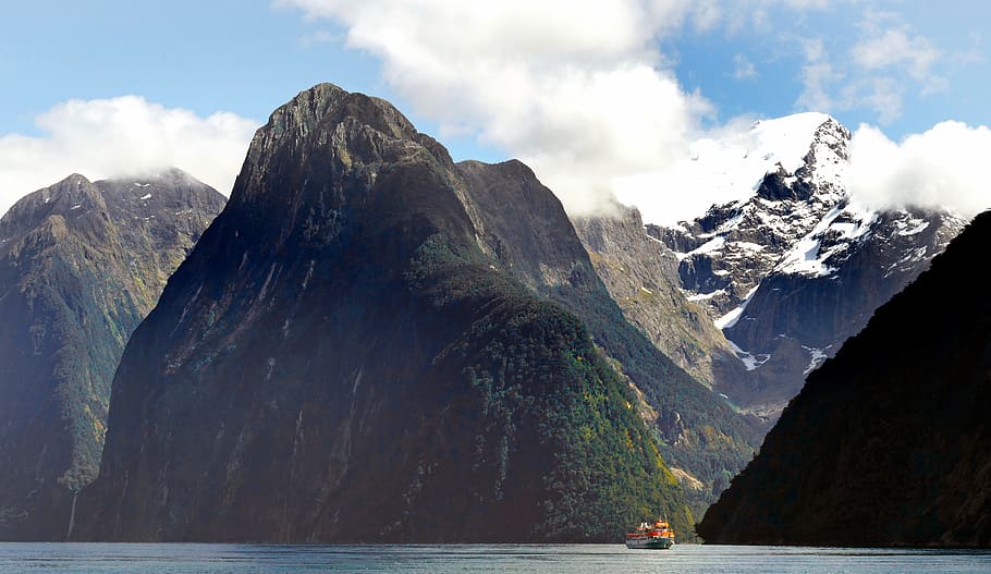 Milford Sound, NZ, body of water, cliffs, calm, mountain, water, beauty in nature, sky, scenics - nature