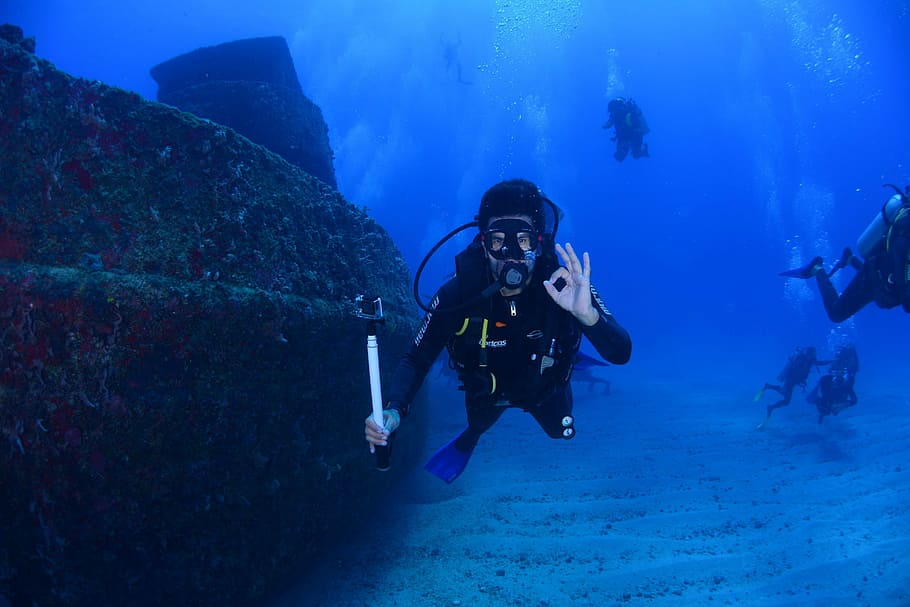 underwater, photography, person, wearing, diving, attire, dive, blue, diving deep, at the bottom of the ocean