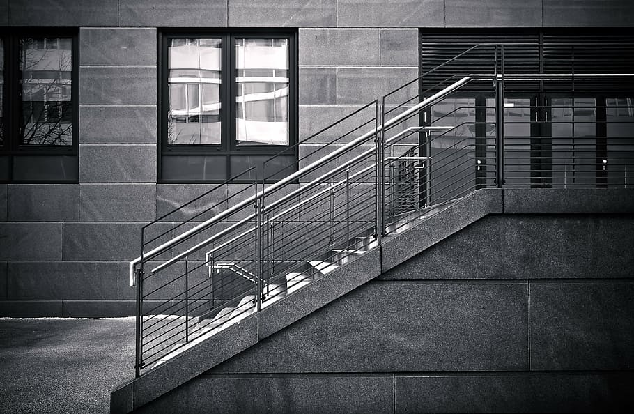 greyscale photography, empty, stair, set, railings, architecture, building, dusk, facade, city