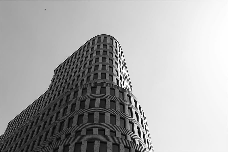 grayscale photo, concrete, building, gray, high, architecture, sky, black and white, skyscraper, low angle view