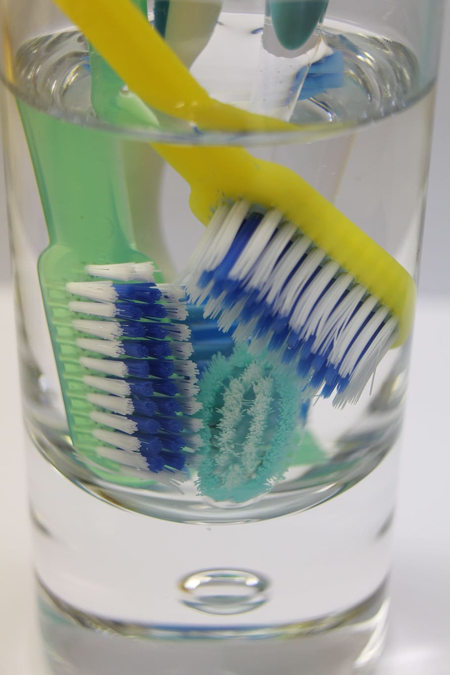 toothbrush, oral, dental, glass, water, clear, hygiene, health care, bristle, green