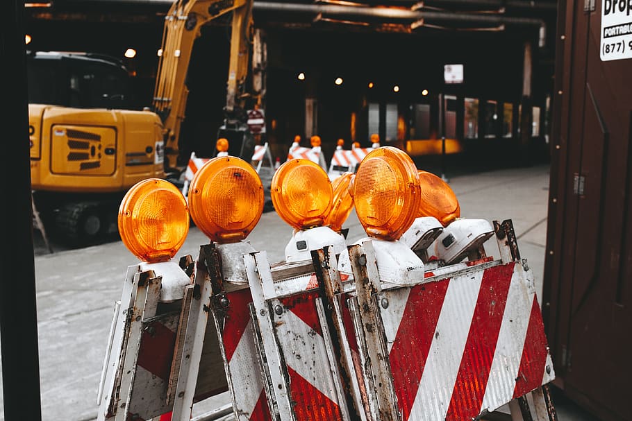 heavy, equipment, truck, traffic, collision, material, orange color, text, communication, focus on foreground