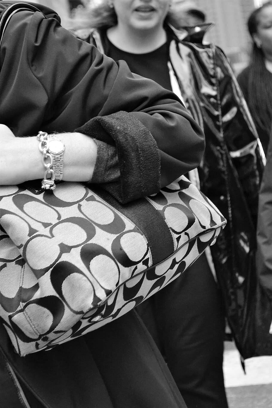 woman, holding, monogrammed, coach shoulder bag, grayscale photography, handbag, woman shopping, fashion, female, shopping