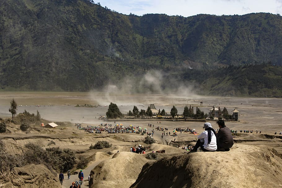 two, people, sitting, boulder, front, mountain, bromo, horse, desert, scenery