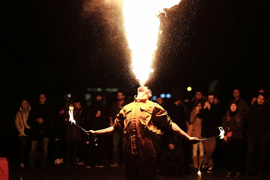 man, spitting, fire photography, performing, front, crowd, people, men, dancer, dancing