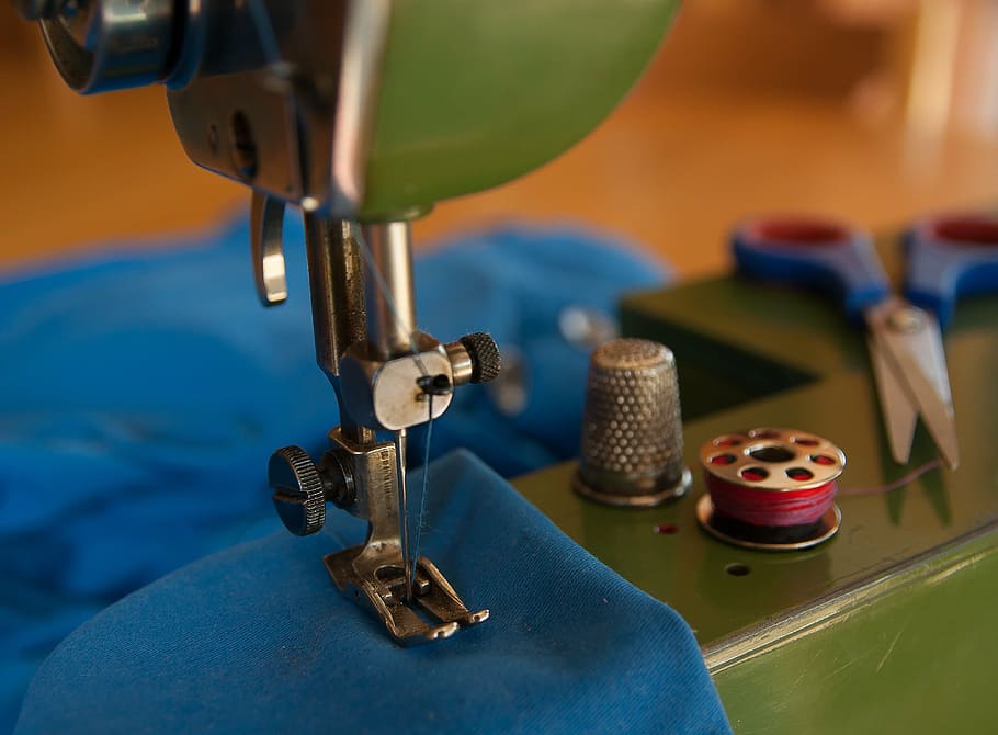 close-up photo, green, gray, sewing machine, couture, thimble, scissors, wire, industry, indoors