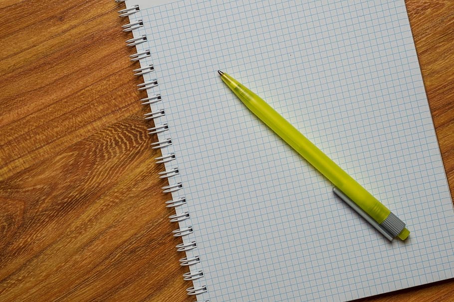 yellow, click pen, top, white, graphing paper, paper, green, click, pen, ballpoint pen