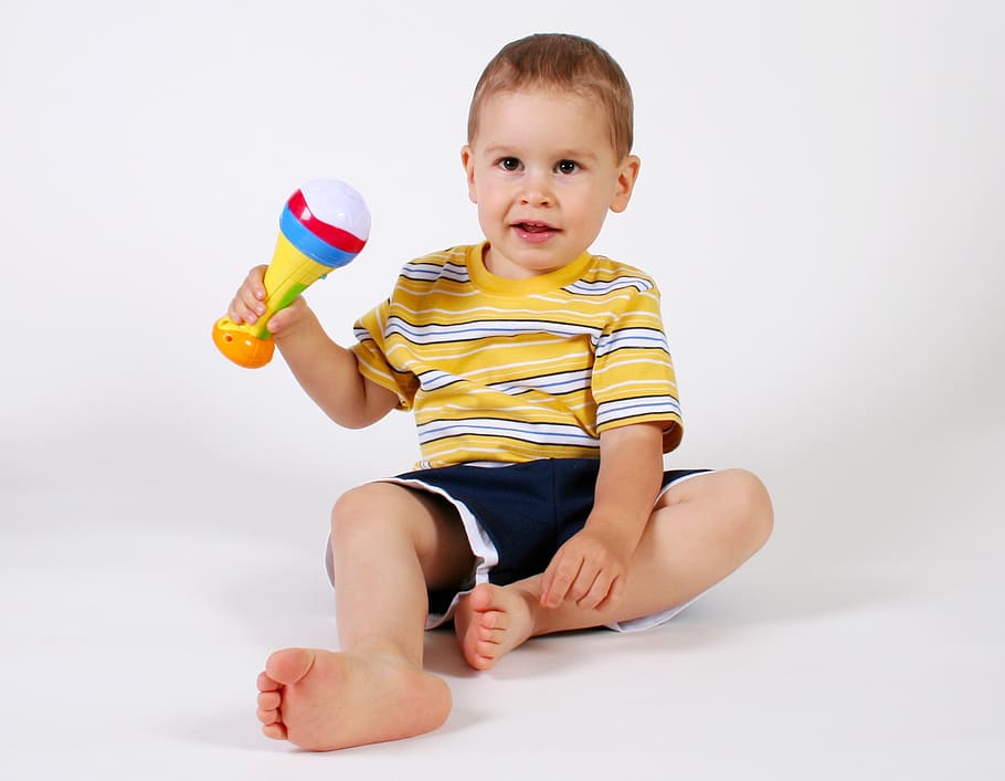 toddler boy, holding, rattle toy, sitting, floor, boys, playing, toddlers, children, young