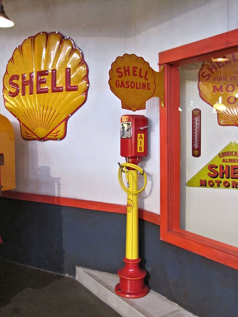 shell logo, air pump, antique, canadian museum, text, communication, yellow, red, architecture, telephone booth