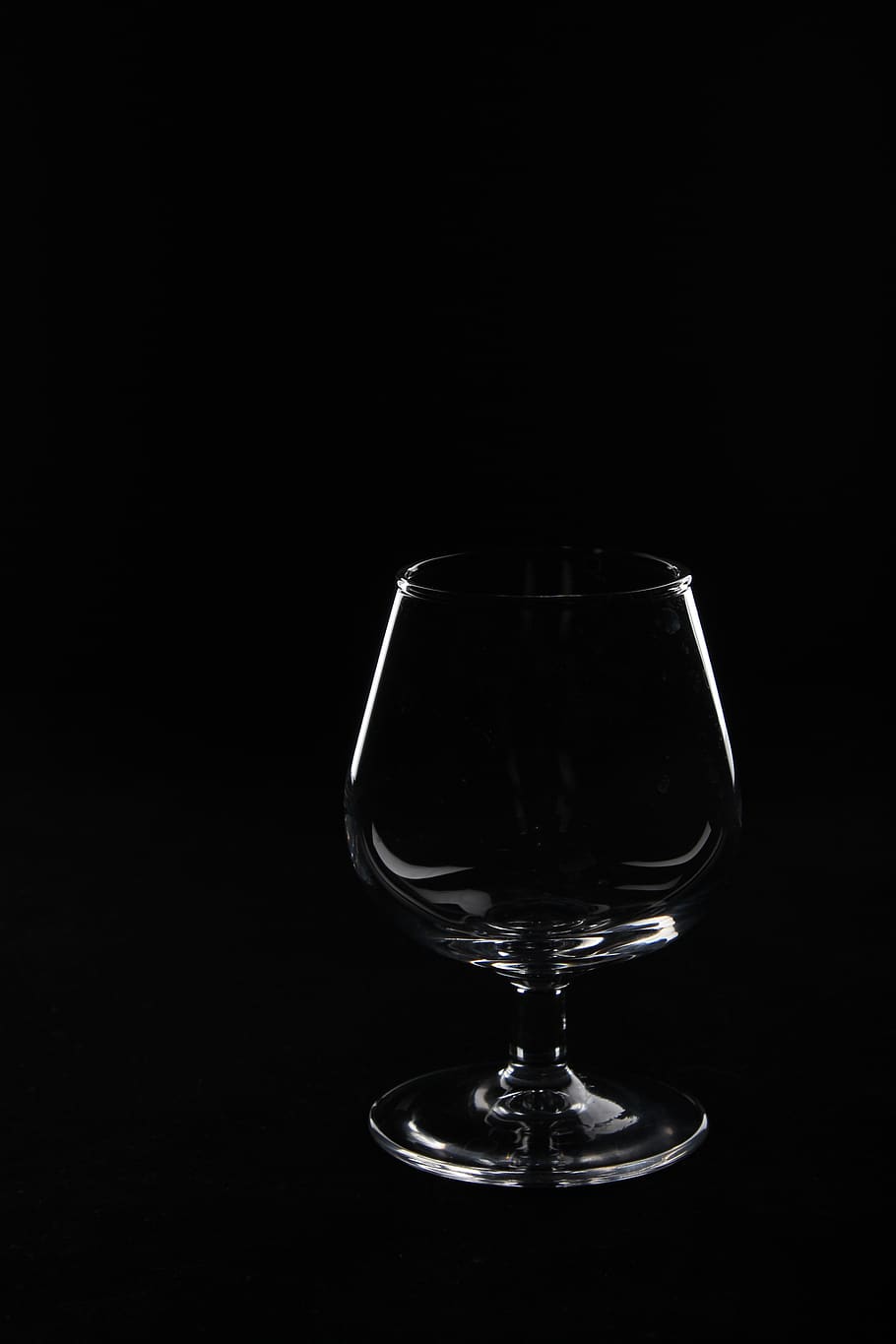 wine, glass container, drink, alcoholic beverage, darkness, glass, cognac, black background, studio shot, food and drink