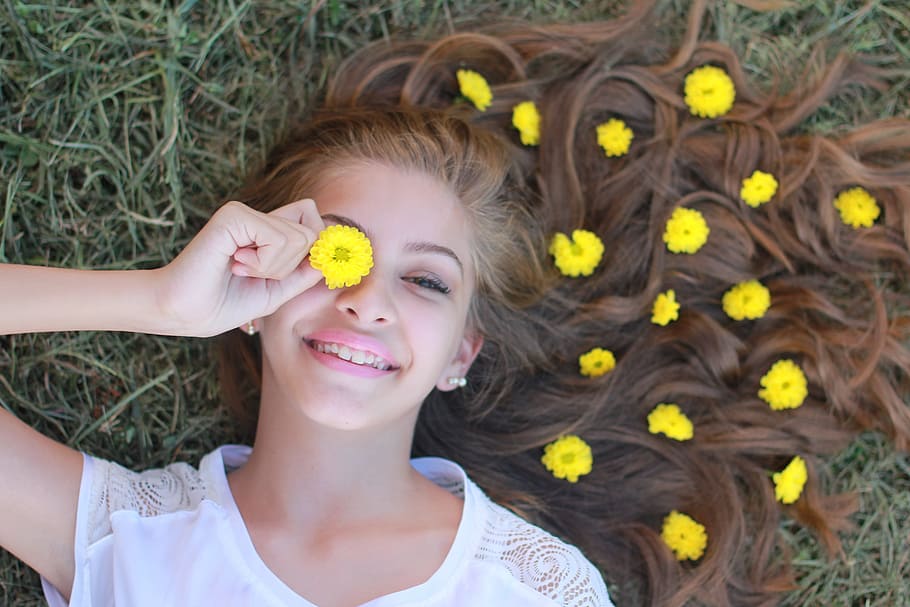 woman, holding, yellow, mums flower, eye, young, teenager, skateboard, model, fun