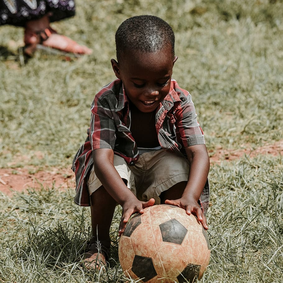 boy, wearing, plaid, shirt, holding, soccer ball, child, kid, happy, soccer